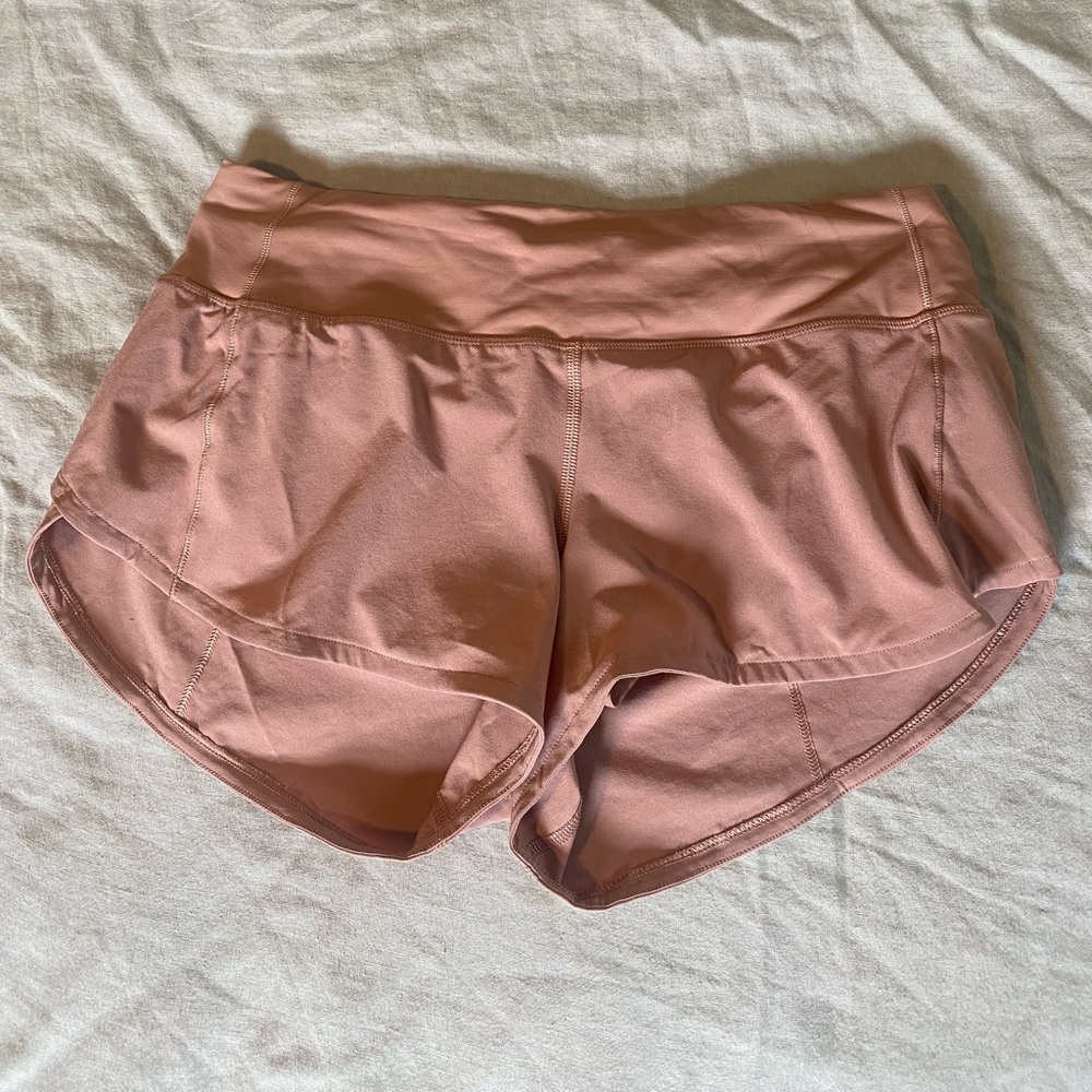 Pink Lululemon running shorts